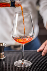 Bartender making cocktail