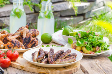 Delicious barbecue with lemonade