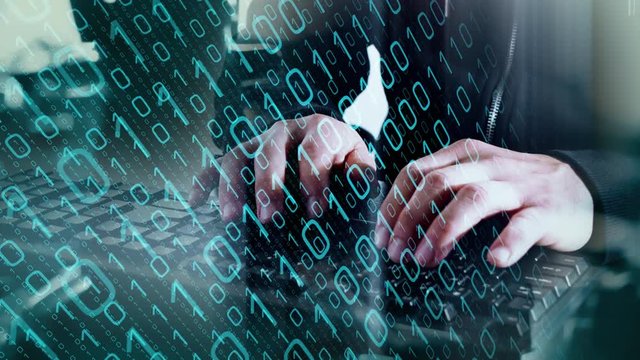 Computer hacker typing on keyboard conception