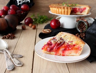 homemade cake with plums and cream filling