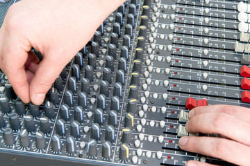 Professional mixing console in studio