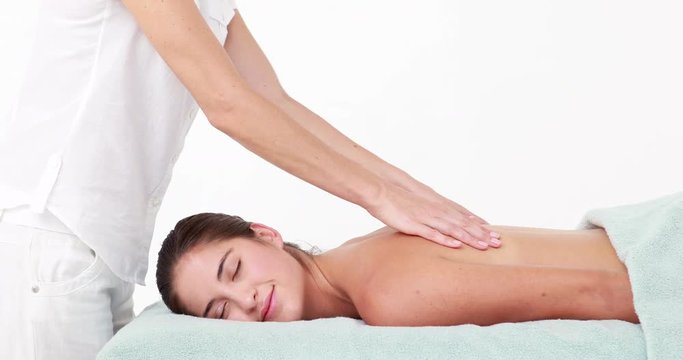 Woman enjoying a back massage 