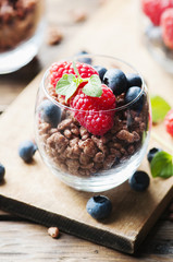 Breakfast with puffed rice and berry