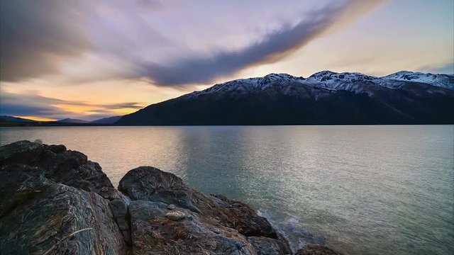 Time lapse of Sunset at Wakatipu Lake, New Zealand.
Time lapse with stacked images creating artistic soft brush stroke effect on the clouds.