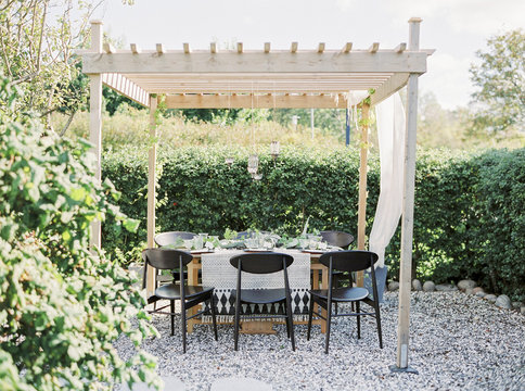 Sweden, Table under gazebo in garden