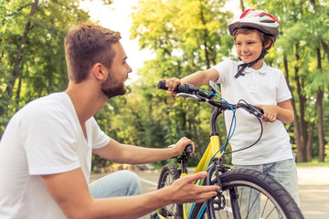 Dad and son cycling