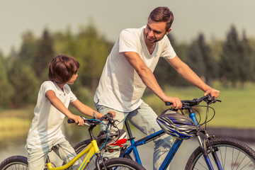 Dad and son cycling