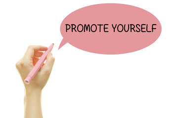 Woman hand writing PROMOTE YOURSELF with a marker isolated on white.