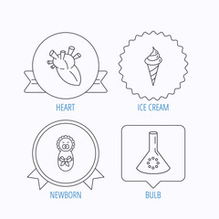 Newborn, heart and lab bulb icons.