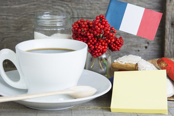Patriotic Breakfast Concept - France flag, decoration color red, blue, sweets, miniature bucket with red berries. Concept - information holidays, dates and events Note for text
