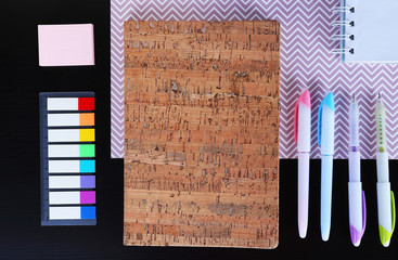 Office and school set with stationery and notebooks on a table