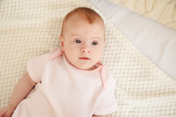 Cute baby on bed