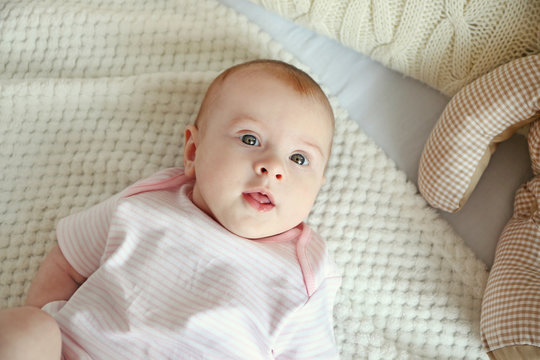 Cute baby on bed