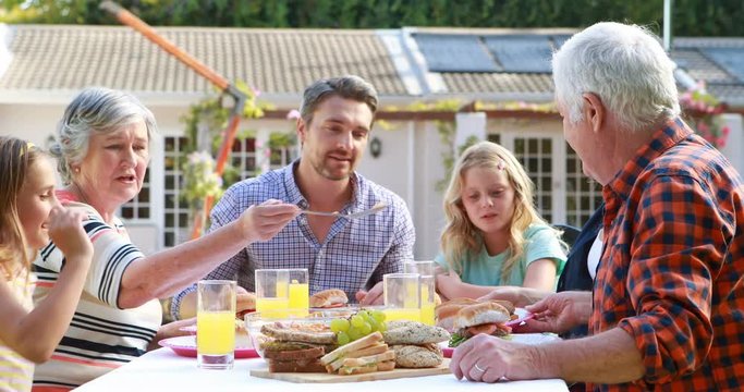Happy family eating lunch