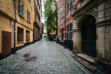 Fototapeta na wymiar A narrow street in Galma Stan, Stockholm, Sweden.