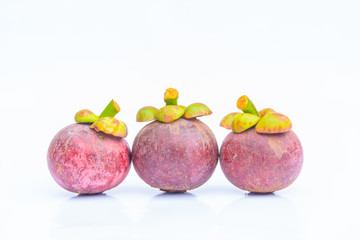 Three mangosteen on white background