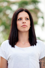Fototapeta premium Young beautiful woman with brunette hair