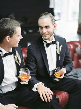 Sweden, Married couple sitting on sofa