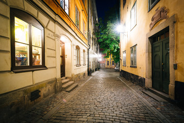 Fototapeta na wymiar Själagårdsgatan at night, in Galma Stan, Stockholm, Sweden.