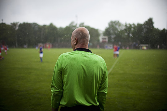 Sweden, Referee standing on soccer field