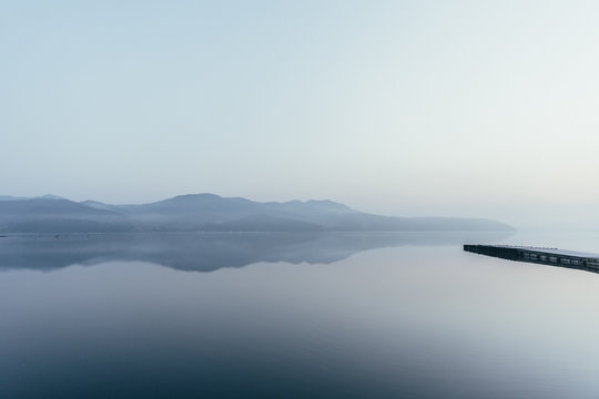 Japan, Izu Peninsula, Mountains reflecting in lake