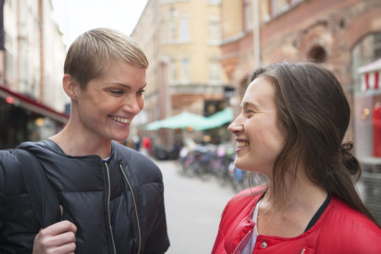 Sweden, Stockholm, Ostermalm, Two women standing face to face