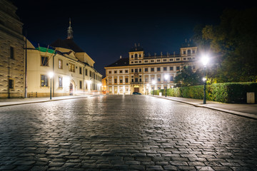 Fototapeta na wymiar Hradčanské nám at night, in Prague, Czech Republic.