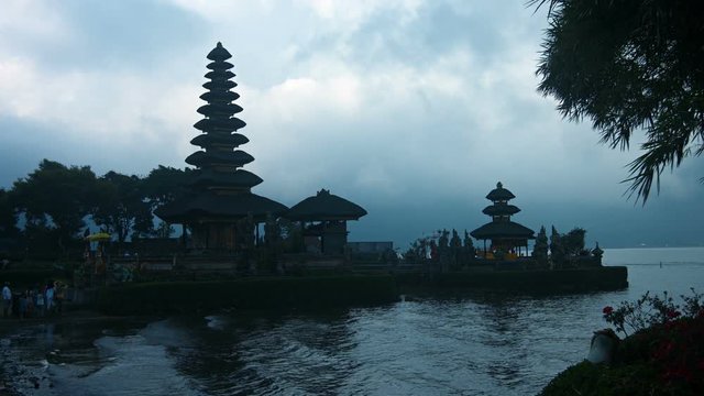 Pura Ulun Danu Bratan, a Shivaite Hindu water temple, located on the shore of Lake Bratan in Bali, Indonesia, at twilight. Video UltraHD