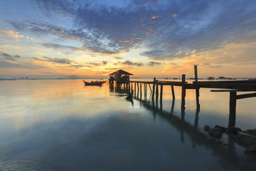 Fototapeta na wymiar Sunrise view at fisherman jetty Jelutong, Penang Malaysia. Nature composition