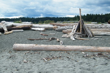 Drift Wood Teepee on a Sandy Beach