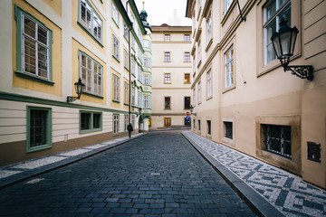 Narrow cobblestone street in Prague, Czech Republic.