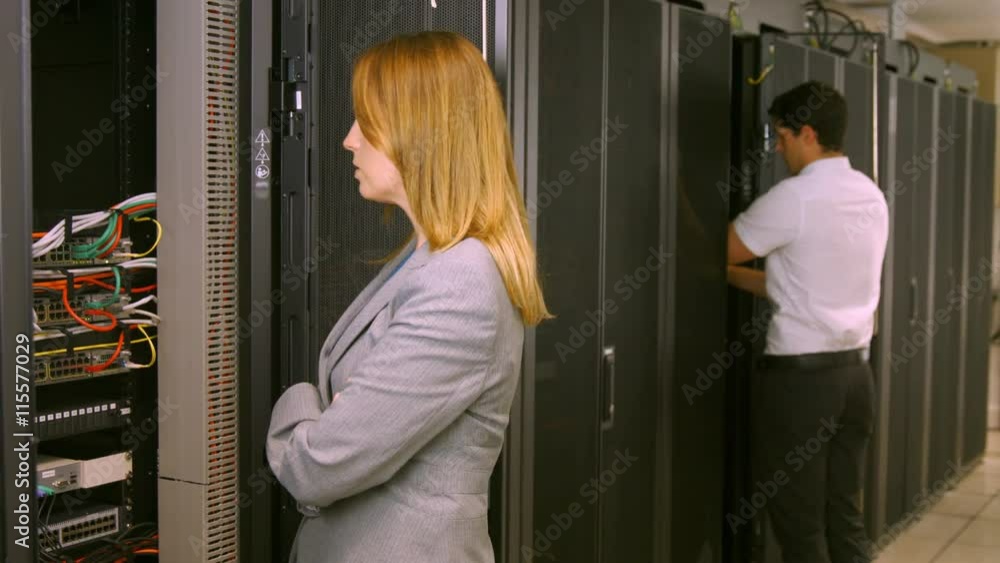 Poster Technicians working in the server room