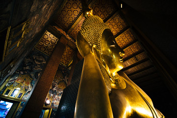 The Reclining Buddha at Wat Pho, in Bangkok, Thailand.