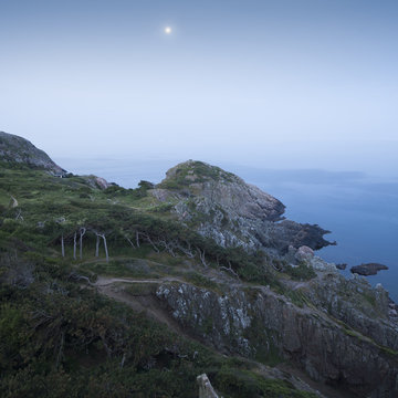 Sweden, Skane, Kullaberg, Coastal landscape with moon
