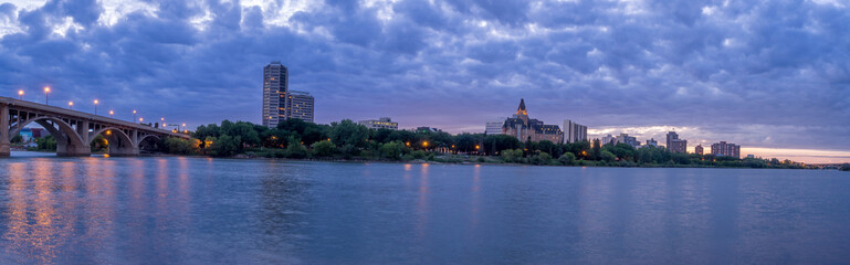 Fototapeta na wymiar Saskatoon skyline at night along the Saskatchewan River.