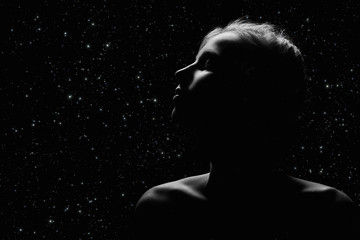 female profile on black © tugolukof