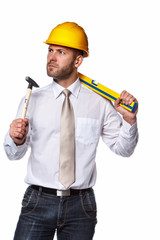 A man holding hummer and level.