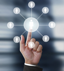 touching virtual  icon of social network.