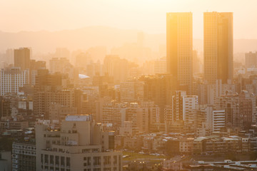 View of buildings in haze at sunset, from Elephant Mountain, in