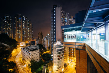 Fototapeta na wymiar View of skyscrapers and Pok Fu Lam Road at night, from Hong Kong