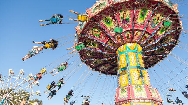 Tradional fairground ride, blue skies, summer fair
