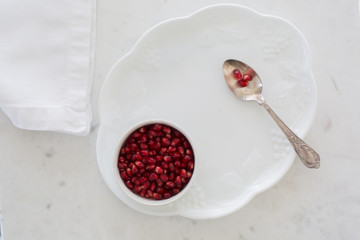 Pomegranate seeds (arils) in high key
