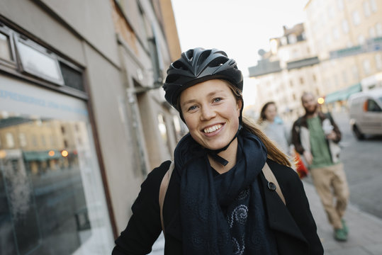 Sweden, Sodermanland, Stockholm, Sodermalm, Portrait of smiling young woman