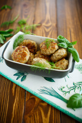 fried cutlet in ceramic form