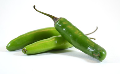 Spicy green serrano pepper (capsicum anuum) - isolated - obrazy, fototapety, plakaty