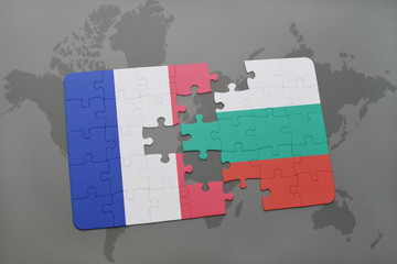 puzzle with the national flag of france and bulgaria on a world map background.