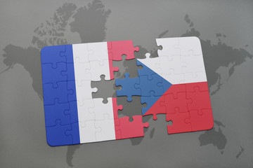 puzzle with the national flag of france and czech republic on a world map background.
