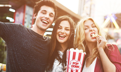Friends Huddle Happiness Amusement Park Festival Concept
