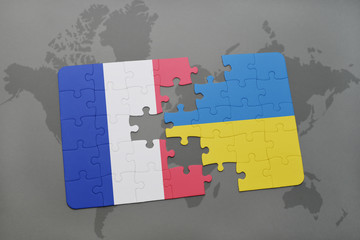 puzzle with the national flag of france and ukraine on a world map background.