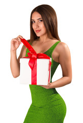 Young beautiful brunette with gift box, isolated on white